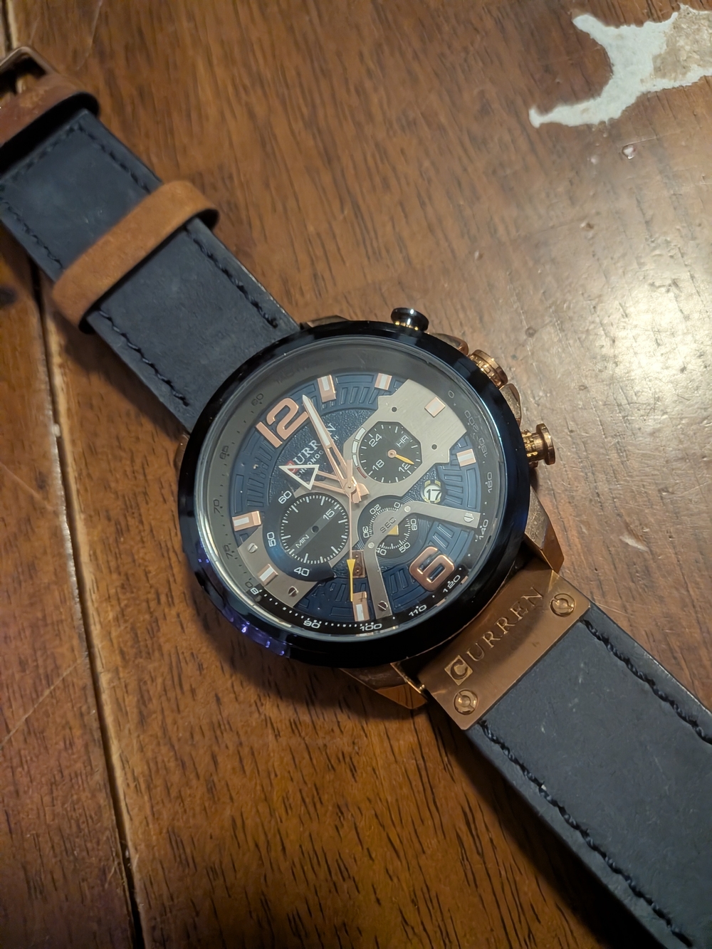 Curren Men's Blue Dial Chronograph Watch with Brown Accents